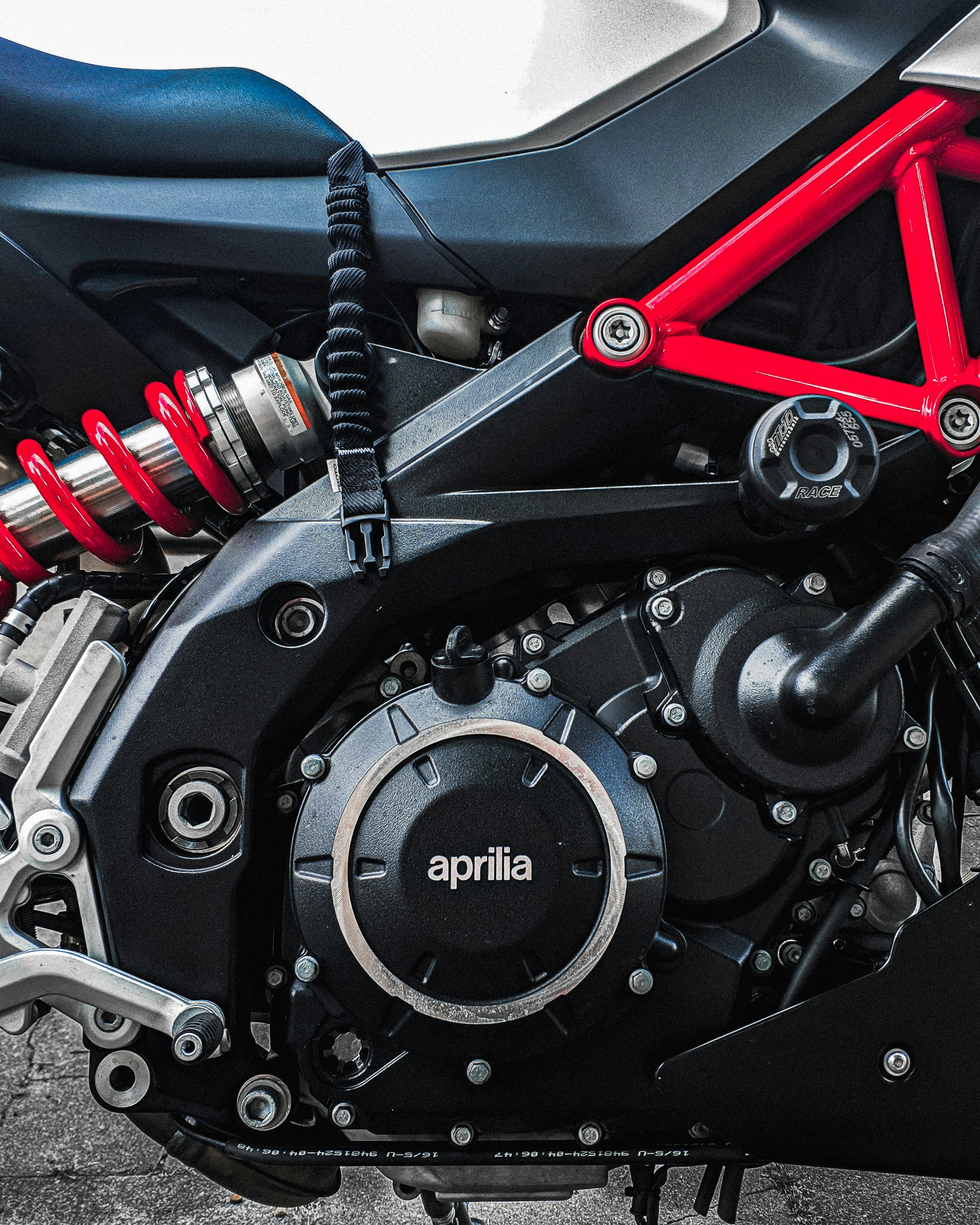 black Aprilia motorcycle engine